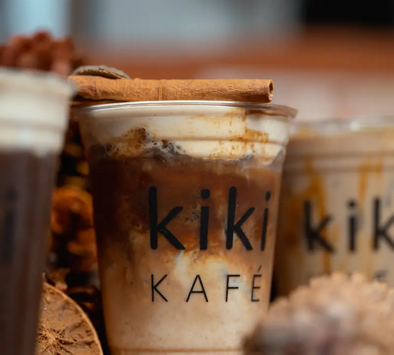 Iced spiced latte with cinnamon and dried orange at Kiki Kafé, Clinton Township