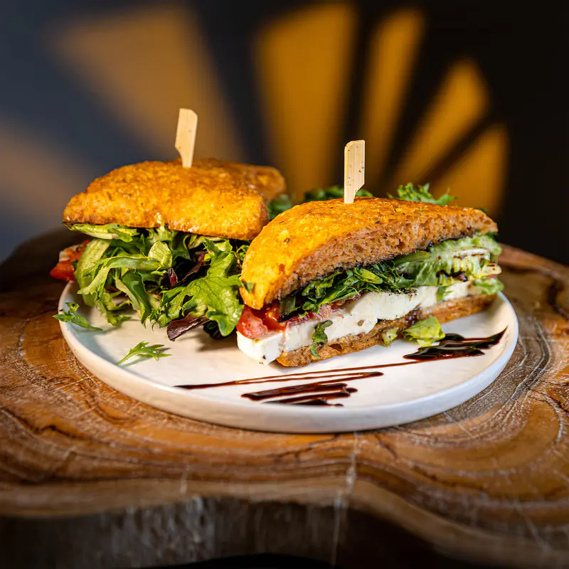 Mozzarella garden sandwich on artisan bread at Kiki Kafé